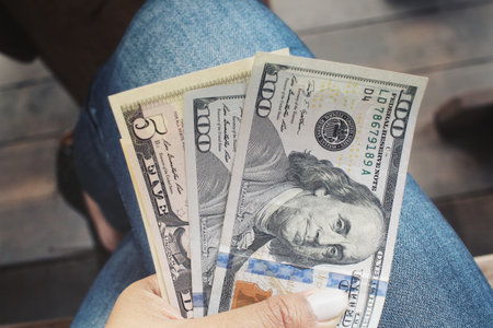 Dollar with hand