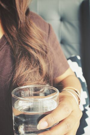Woman drinking waterの写真素材