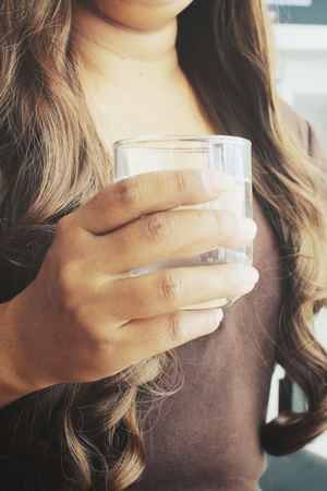 Woman drinking waterの写真素材