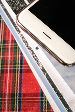 Books with smart phoneの写真素材