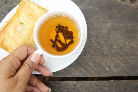 Puff pastry with hot teaの写真素材