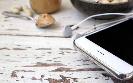 Peanut butter with smart phoneの写真素材