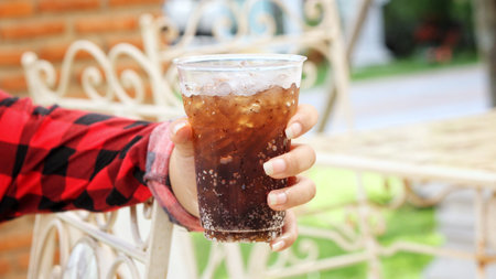 Woman drinking cola