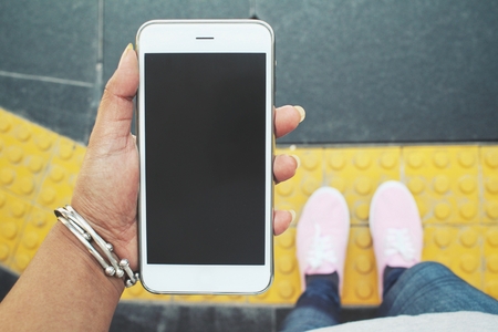 Woman using smart phoneの写真素材