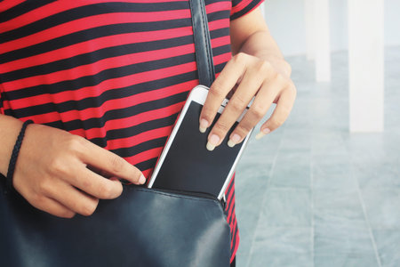 Smart phone on hand with bag