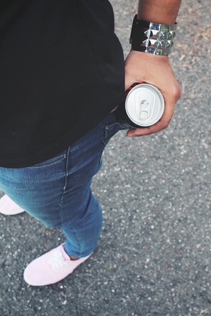 Cola can on handの写真素材