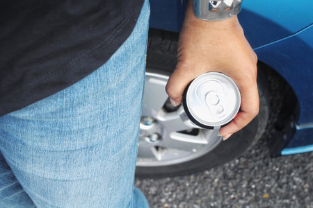 Cola can on hand
