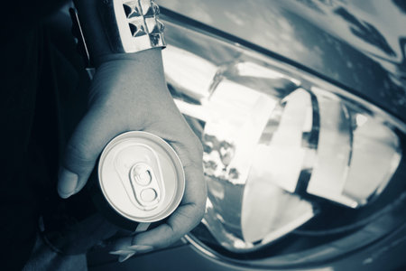 Cola can on handの写真素材