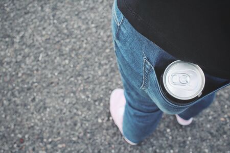 Woman with cola canの写真素材