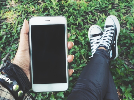 Woman using smart phoneの写真素材