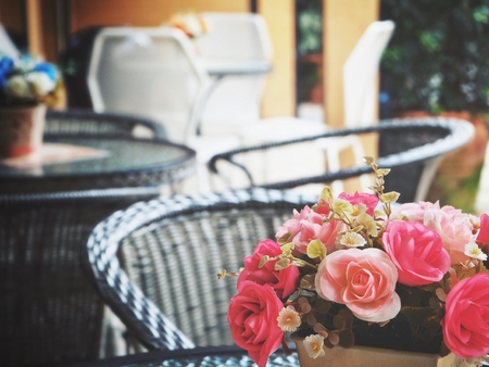 Beautiful of rose artificial flowers at cafeの写真素材