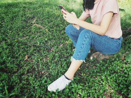 Woman using smart phoneの写真素材