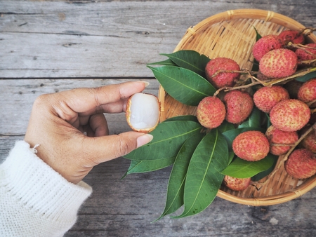 lychee on wood backgroundの写真素材