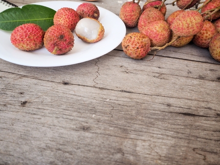 lychee on wood backgroundの写真素材
