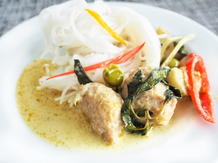 Taste of curry coconut milk and fish with rice noodlesの写真素材