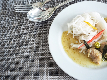 Taste of curry coconut milk and fish with rice noodlesの写真素材