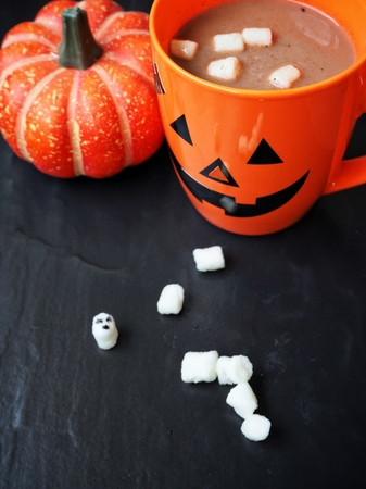 Hot chocolate with marshmallows for halloween partyの写真素材