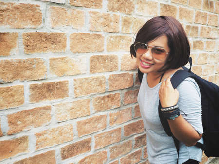 Woman traveling with backpackの写真素材