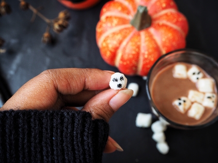 Hot chocolate with marshmallows for halloween partyの写真素材