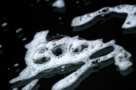 Bubbles of washing carの写真素材