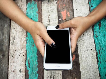 Woman using smart phoneの写真素材