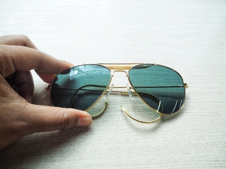Sun glasses on handの写真素材