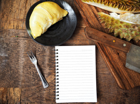 Durian with blank notepadの写真素材