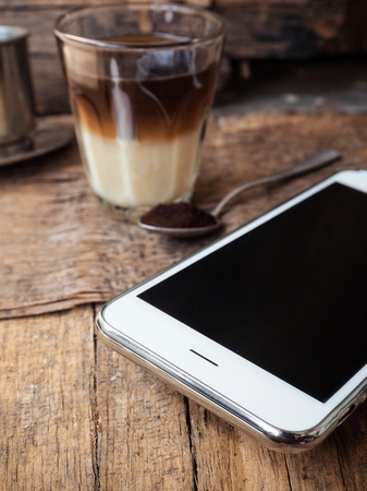 Coffee vietnam with smart phoneの写真素材