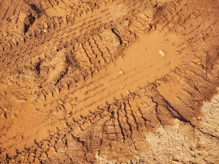 Wheel tracks on the soilの写真素材