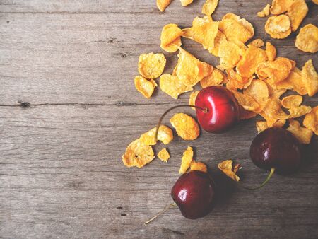 Corn flakes and cherryの写真素材
