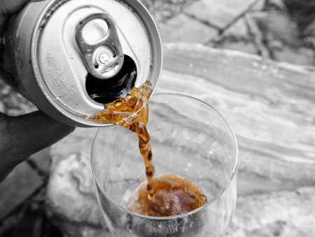 Woman pouring cola drink