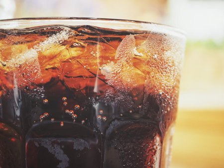 Cola with ice cubes
