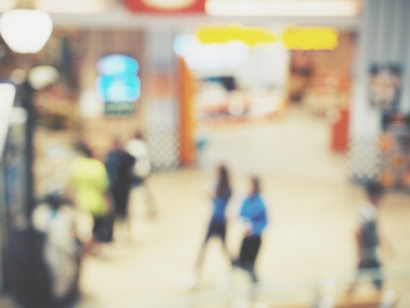 Blurred people shopping mallの写真素材