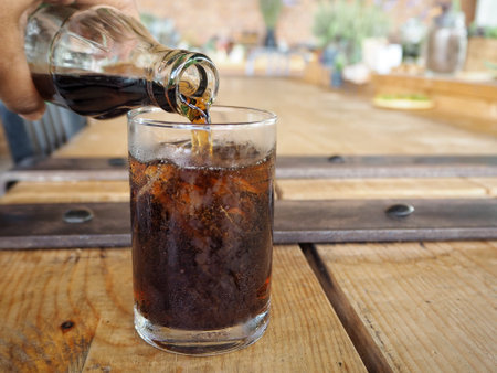 Cola with ice cubes