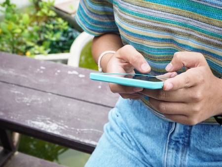 Woman using smart phoneの写真素材