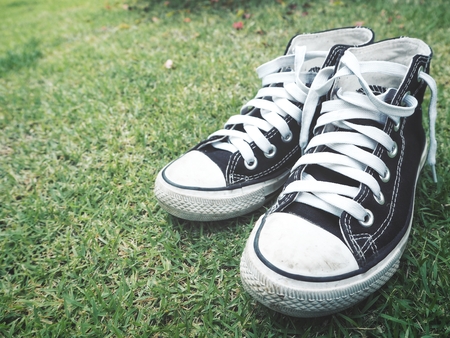 Sneakers close up outdoor on grassの写真素材