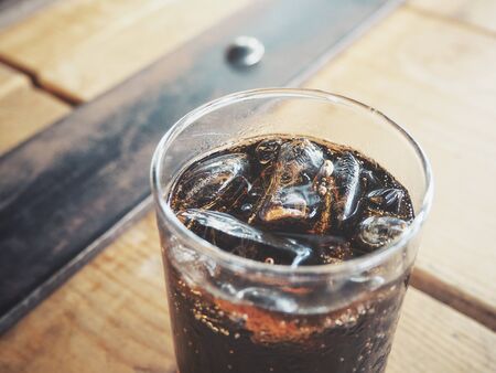 Cola with ice cubesの写真素材