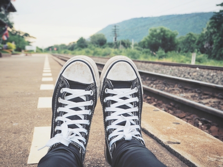 Selfie of sneakers with mountainの写真素材