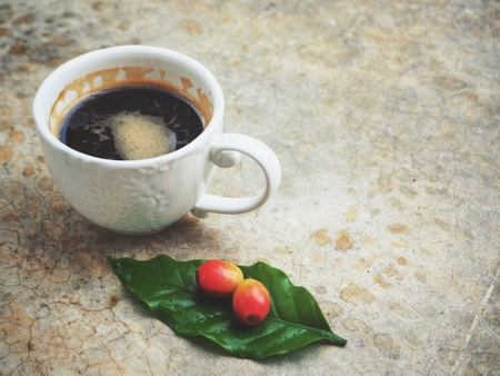 Espresso coffee with beansの写真素材
