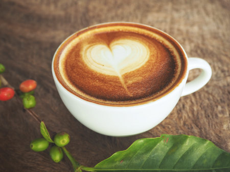 Latte art coffee with beans