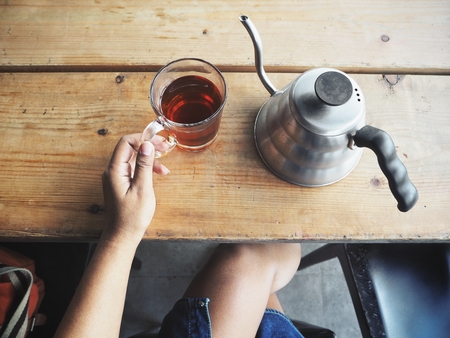 Woman drinking hot teaの写真素材