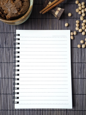 Miso paste with blank notepadの写真素材
