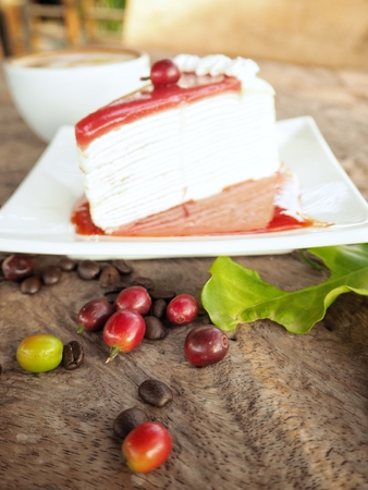 Crepe cake with coffee cupの写真素材