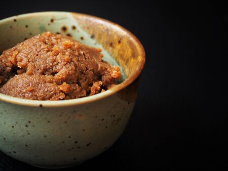 Miso paste on black backgroundの写真素材
