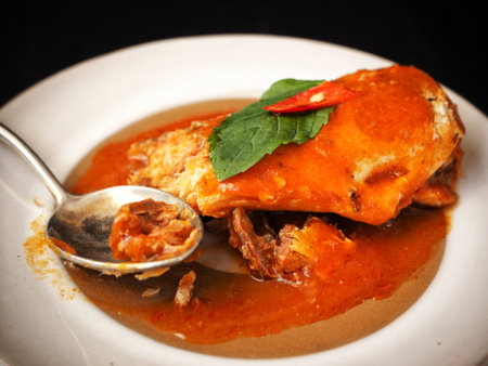 Canned fish on black backgroundの写真素材