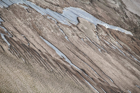 Cracked dry soil with water