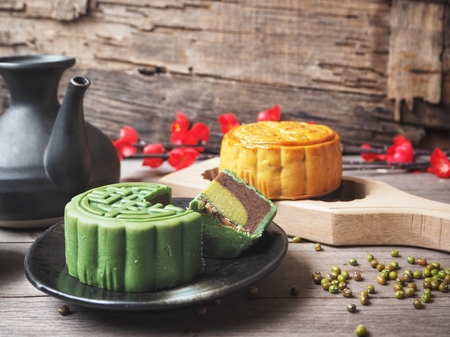 Green tea festival moon cake with tea potの写真素材