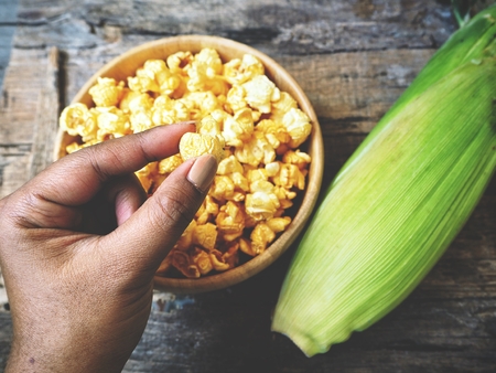 Eating popcornの写真素材