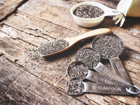 Chia seeds with spoonsの写真素材