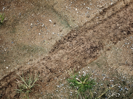 Wheel tracks on the soilの写真素材
